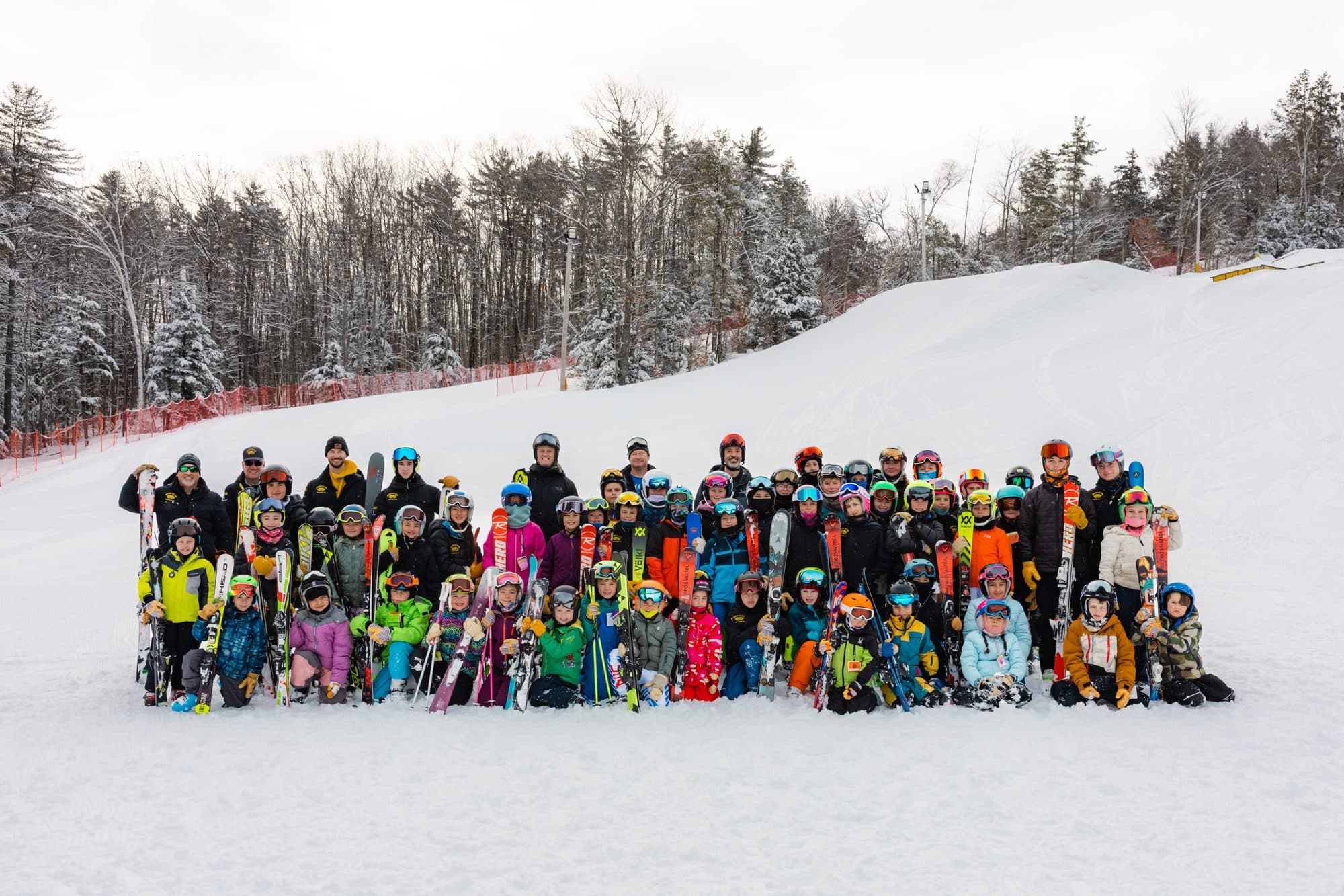 The whole Abenaki Ski Team lined up across the slope for the annual team photograph